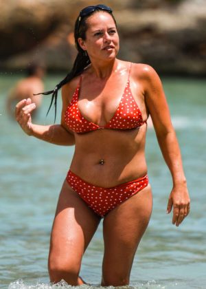 Karan Danczuk in Red Bikini on the beach in Spain
