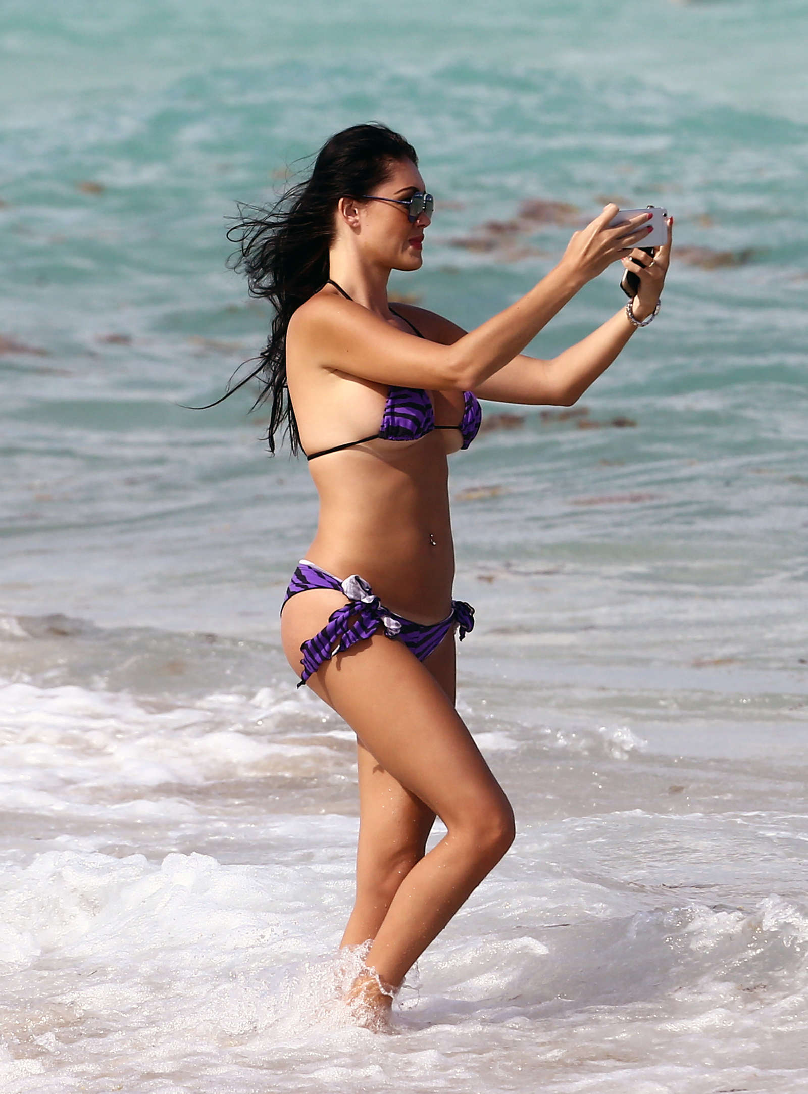 Karin Chiche in Bikini on the beach in Miami. 