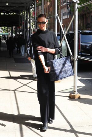 Karlie Kloss - In an all-black ensemble on a stroll in New York