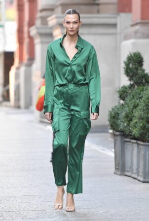 Karlie Kloss - In green pants and top for the Revolve party in New York