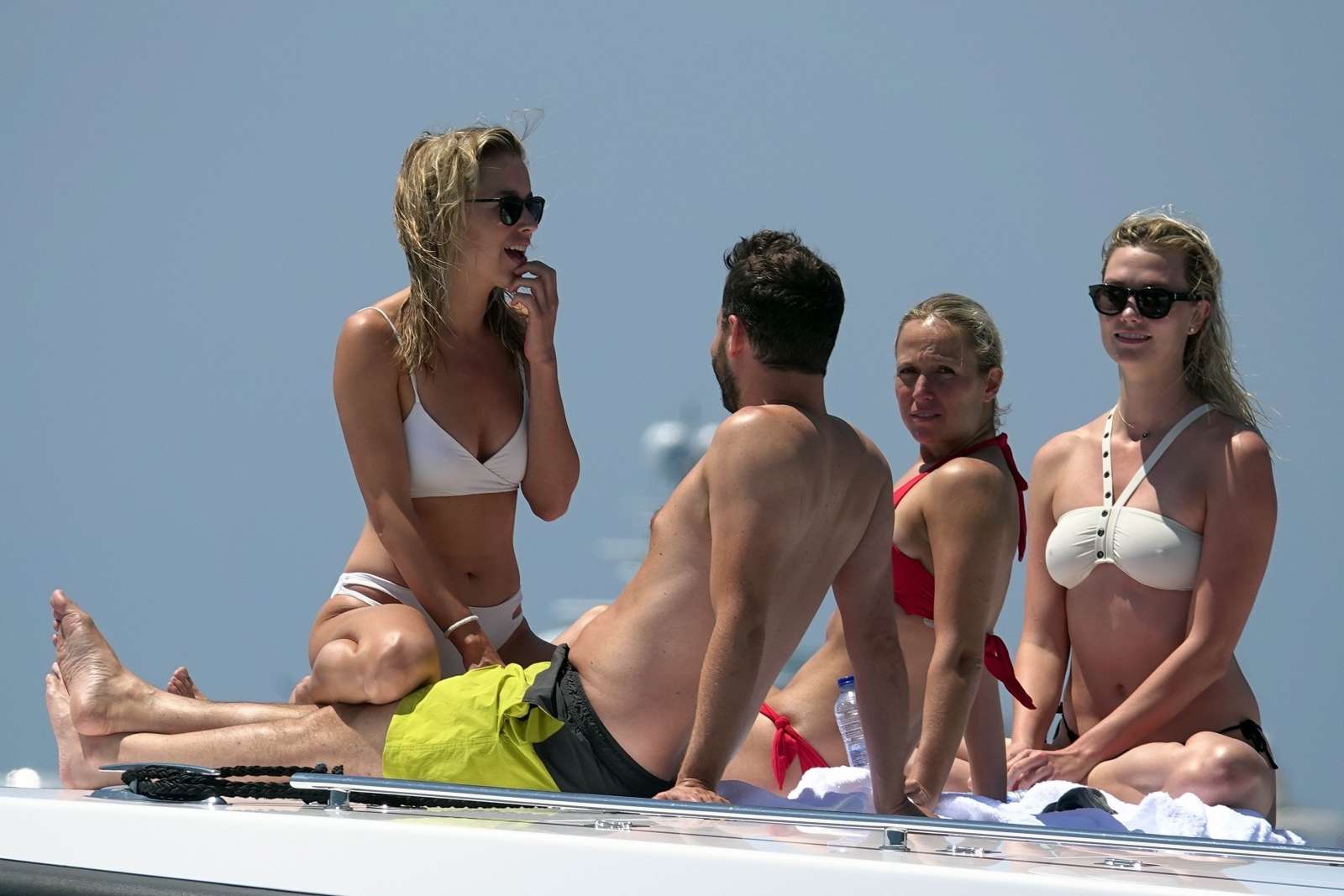 Karlie Kloss in White and Black Bikini on holiday in Capri. 