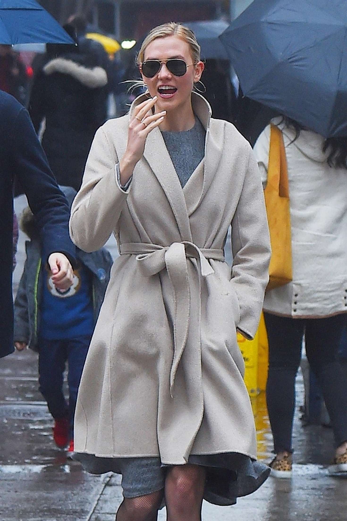 Karlie Kloss on the rain out in New York City