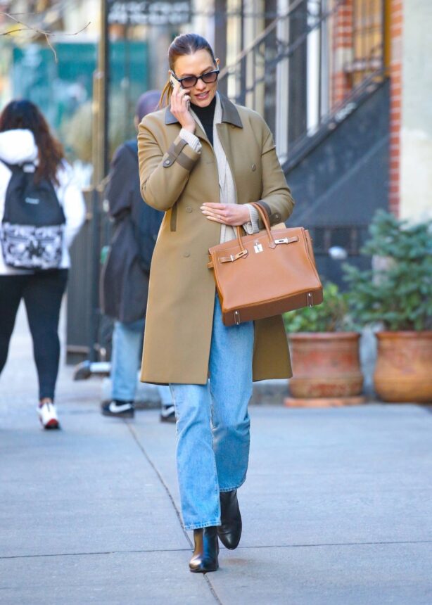 Karlie Kloss - Seen in a leather trench coat whiole out in New York