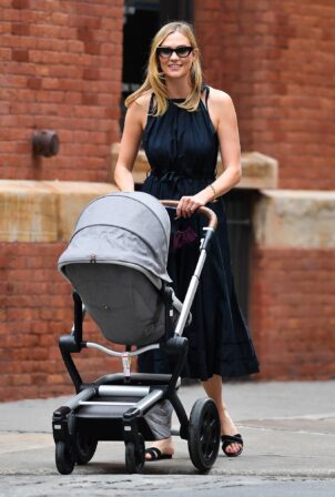 Karlie Kloss - Takes baby Levi for a stroll in New York