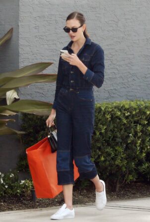 Karlie Kloss - Wearing denim jumpsuit in Miami
