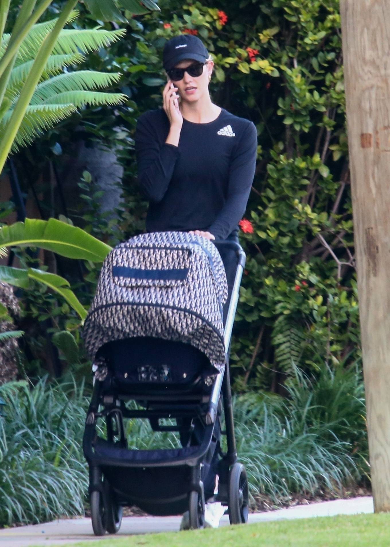 Karlie Kloss - With her baby boy Levi out in Miami Beach