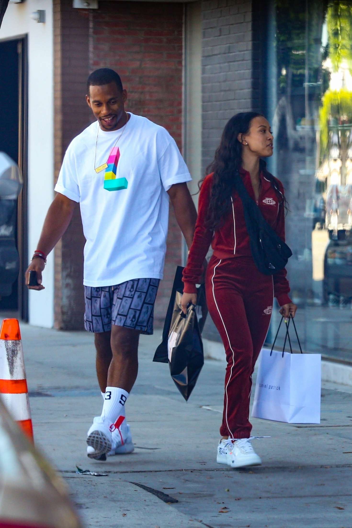 Karrueche Tran and her boyfriend shopping in Hollywood -05 | GotCeleb
