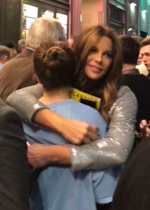Kate Beckinsale - Shares a hug with a friend at the Pantages Theatre in Hollywood