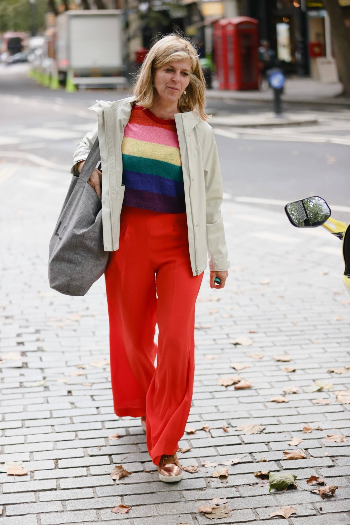Kate Garraway 2021 : Kate Garraway – In a rainbow jumper catches a limo bike at Smooth radio in London -02