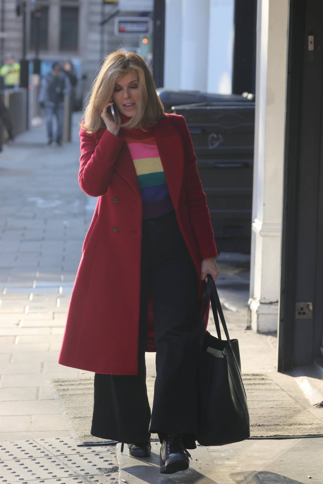 Kate Garraway 2022 : Kate Garraway – Out in a rainbow top and red coat earring at Global offices in London-05