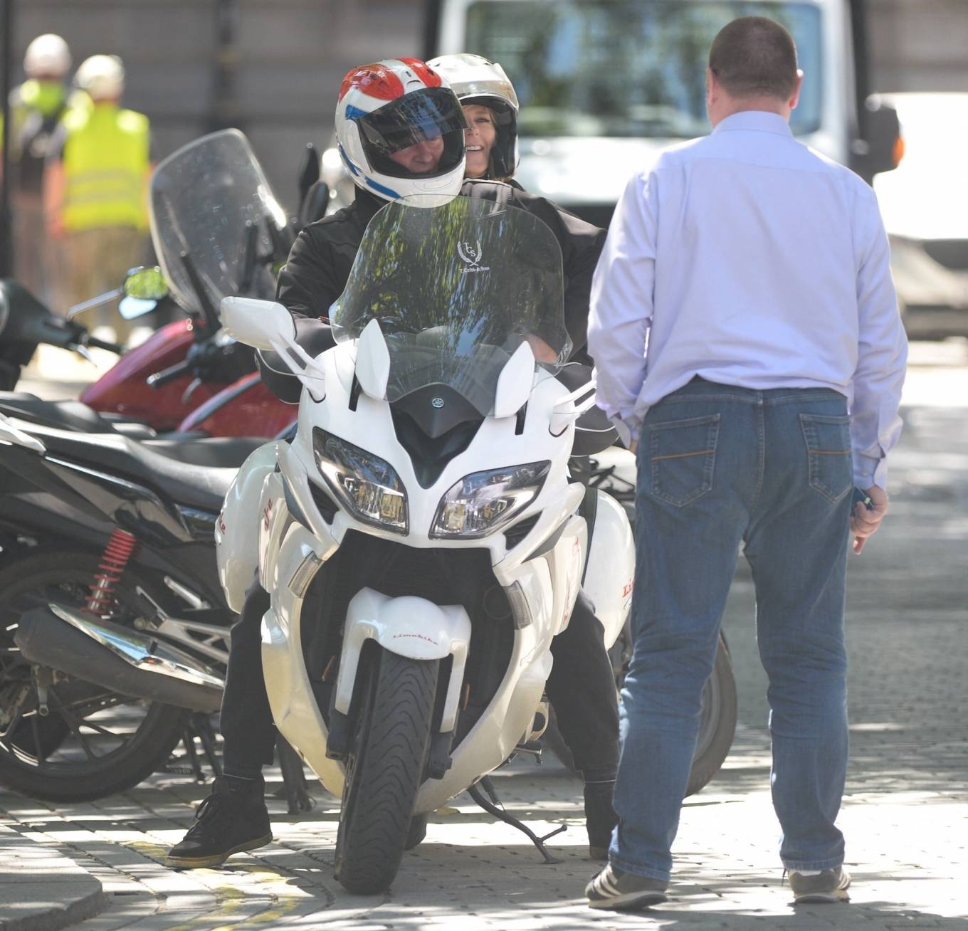 Kate Garraway - Picked up from work via a motorbike in London
