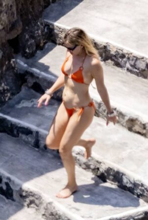 Kate Hudson - In an orange bikini in Positano