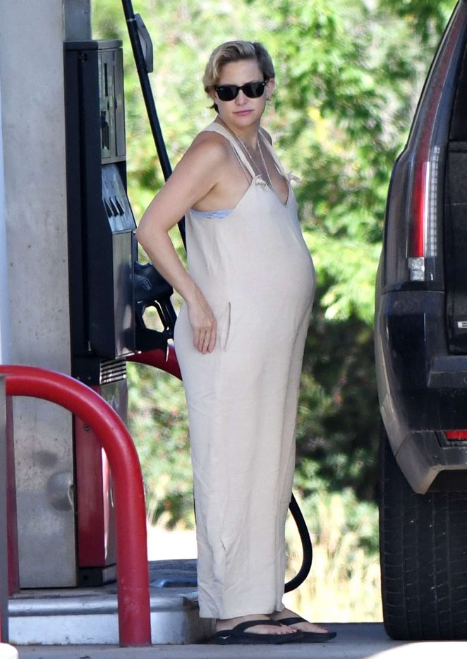 Kate Hudson in Long Dress at a gas station in Aspen
