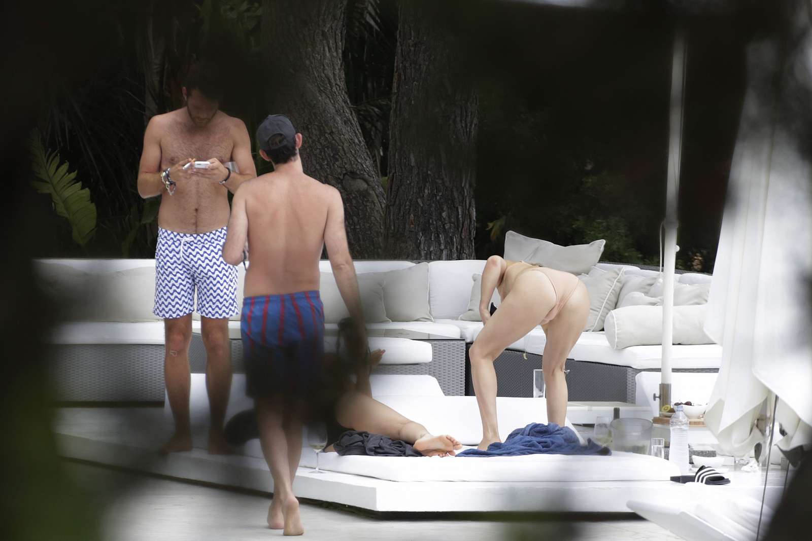 Kate Hudson - Wearing a bikini at a pool in Ibiza. 