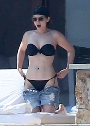 Kate Mara in Black Bikini at a pool in Mexico