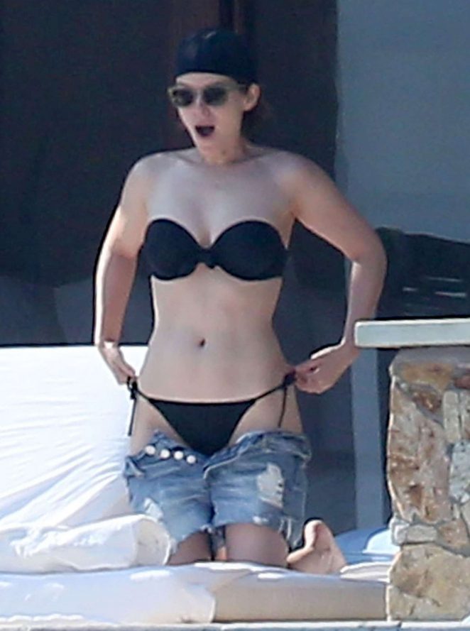 Kate Mara in Black Bikini at a pool in Mexico