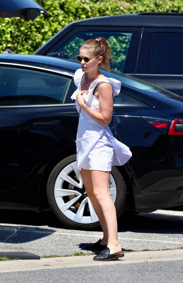 Kate Mara - Rocks in mini white dress while leaving Aritzia store in Beverly Hills