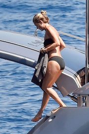 Kate Moss on a boat with friends in Portofino