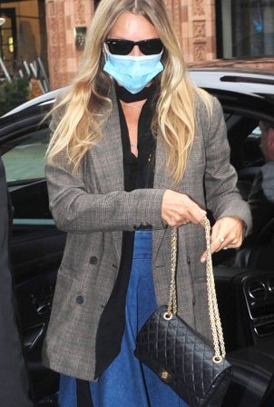 Kate Moss - Wearing a protective face mask in London