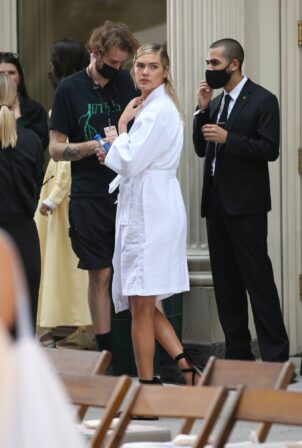 Kate Upton - In a white bathrobe during New York Fashion Week