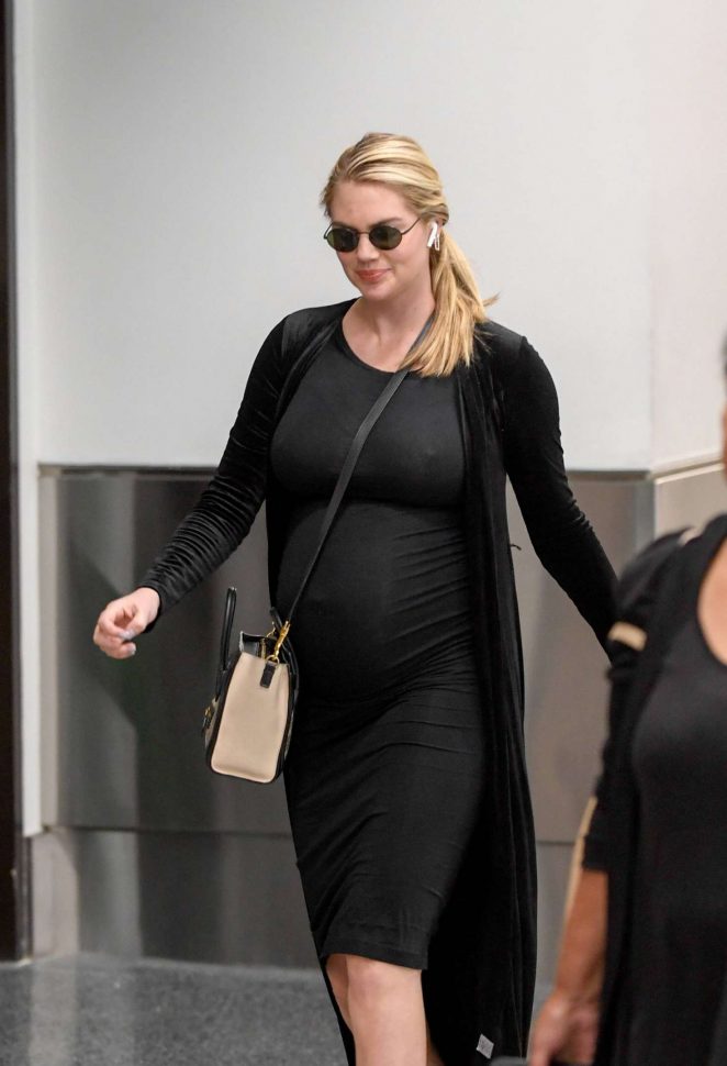 Kate Upton in Black Dress at LAX airport in Los Angeles