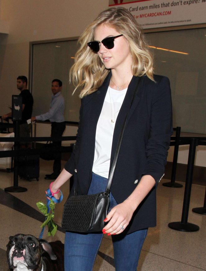 Kate Upton with her dog at LAX Airport in Los Angeles