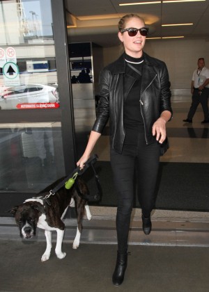 Kate Upton with her dog at LAX in Los Angeles