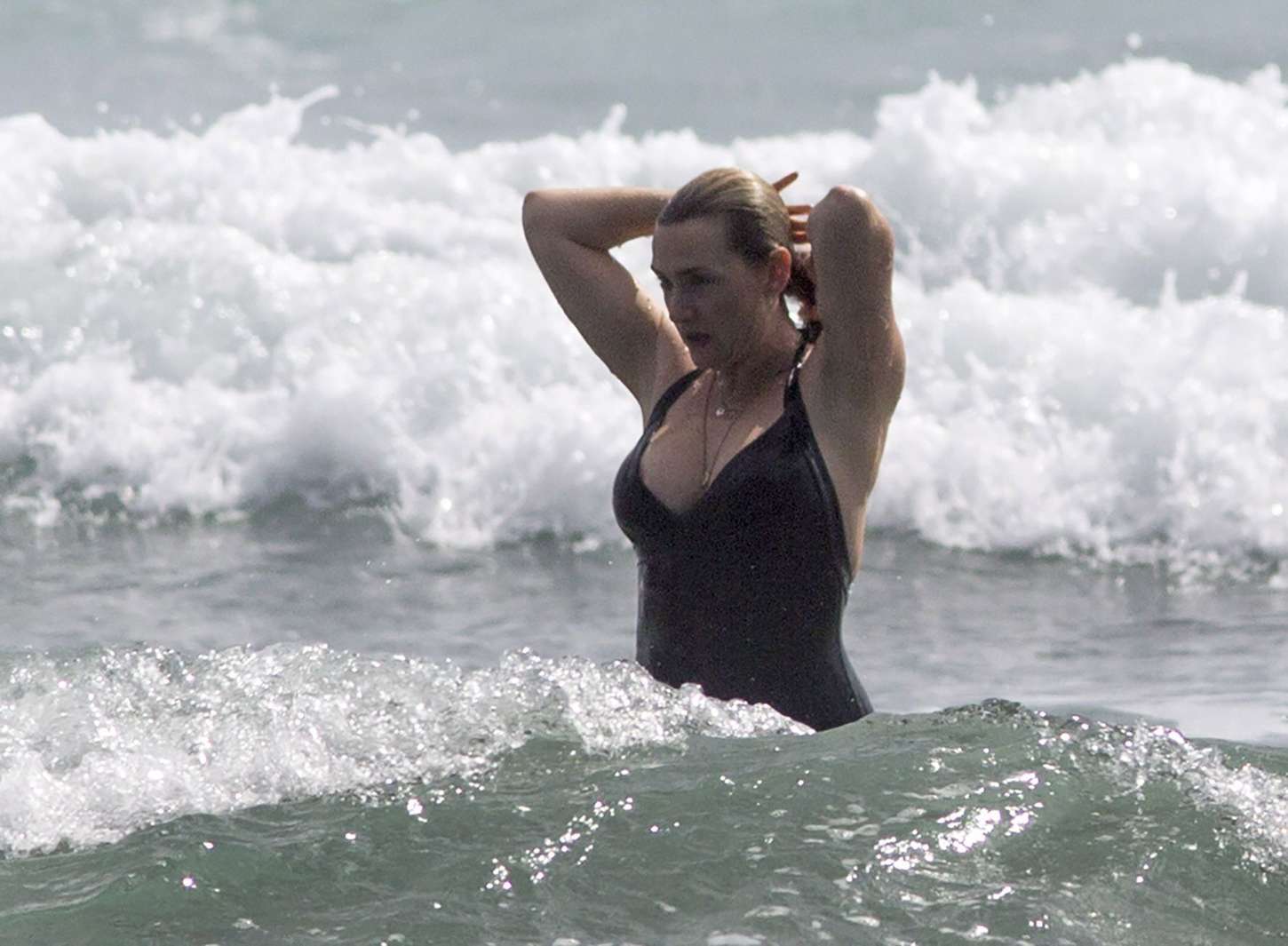 Kate Winslet - Wearing a Swimsuit at a beach in Auckland. 