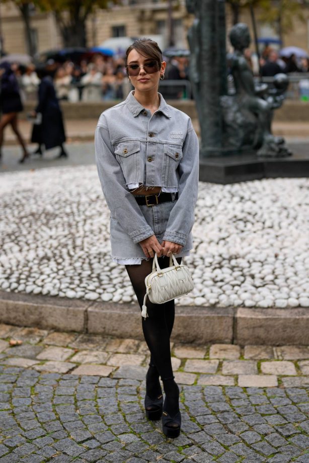 Katherine Langford - In a denim skirt at Paris Fashion Week