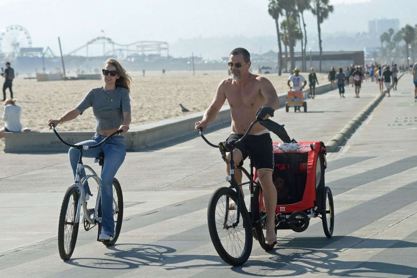 Kathryn Boyd and Josh Brolin - Ride bicycles by the beach in Santa Monica. 
