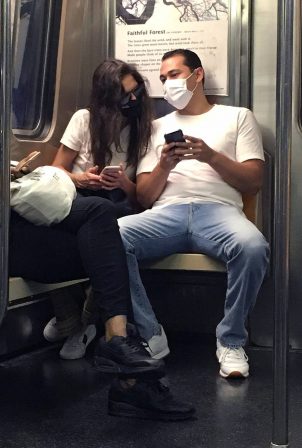 Katie Holmes and Emilio Vitolo Jr. riding the Downtown Subway train in Manhattan