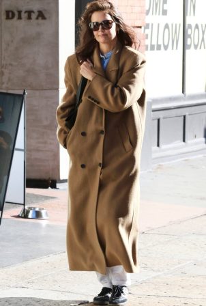 Katie Holmes - In a brown camel coat while on a stroll in Manhattan’s SoHo area
