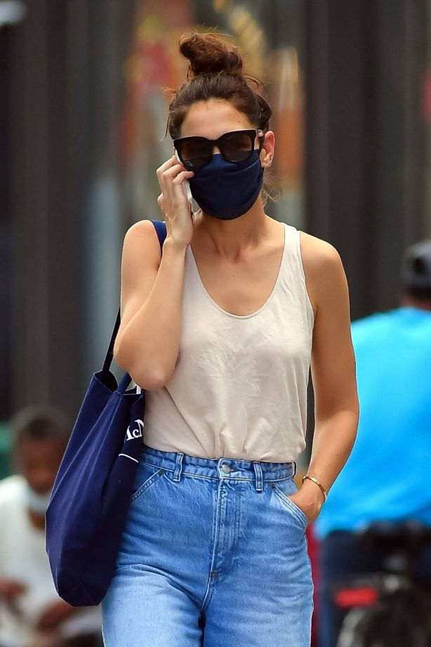 Katie Holmes - In denim and a peach tee shirt in New York