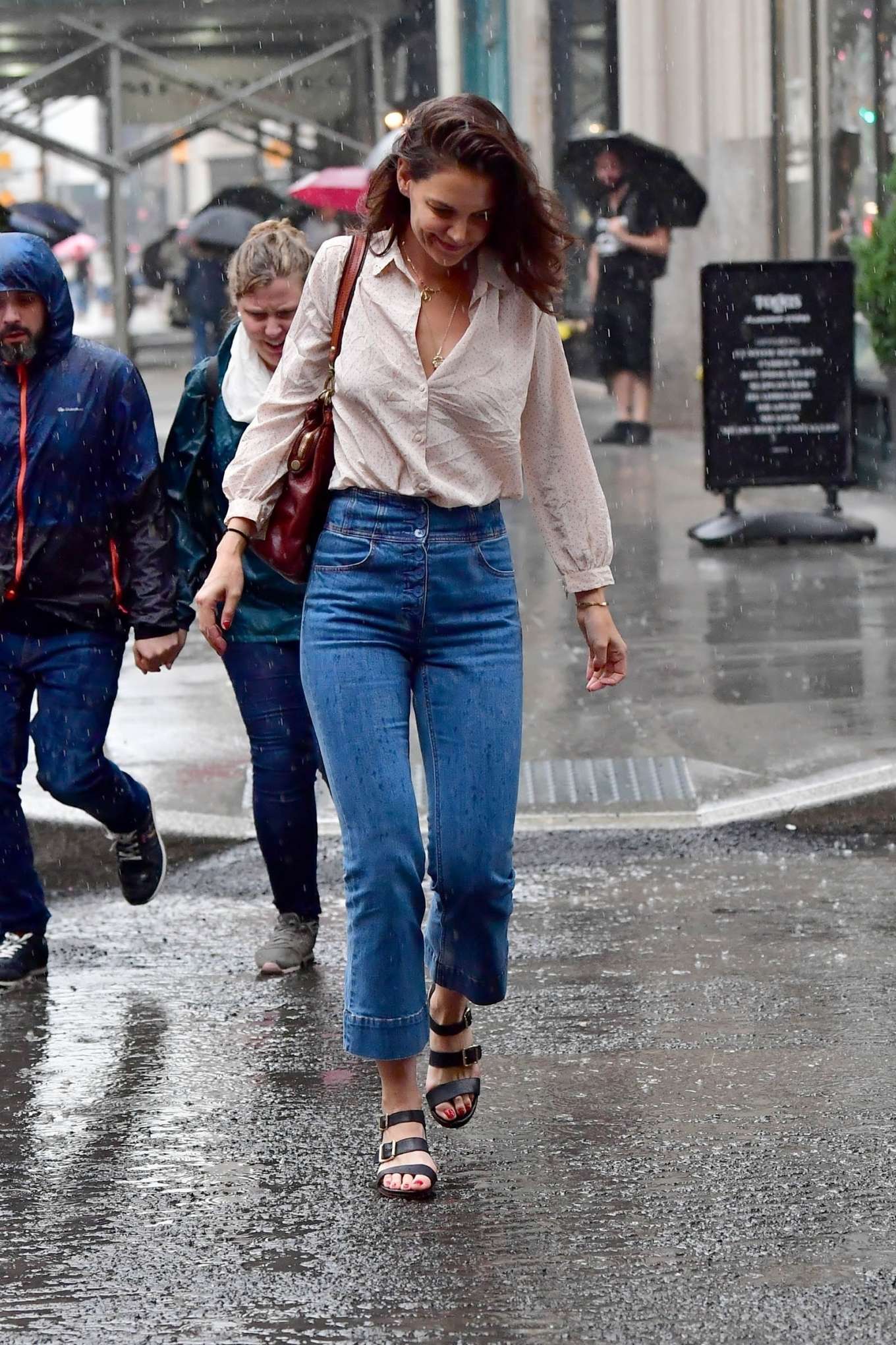 Katie Holmes â€“ Walk in the rain in New York City