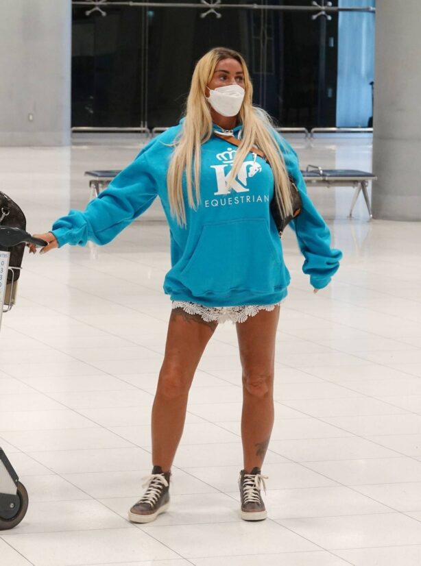 Katie Price - With boyfriend Carl Woods spotted at Thailand Airport