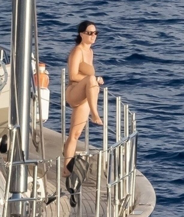 Katy Perry - In a brown strapless swimsuit enjoying a holiday in Nerano