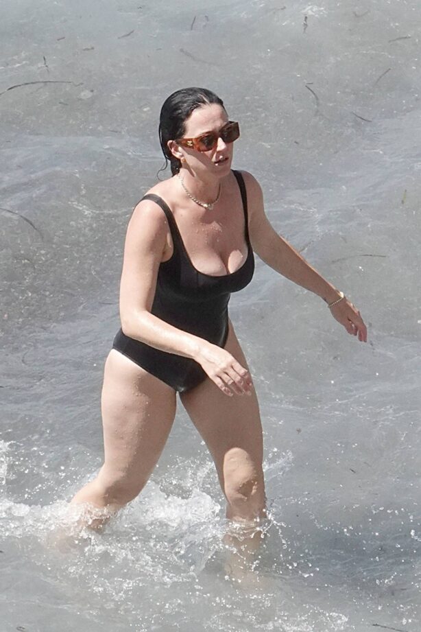 Katy Perry - Spotted in a black swimsuit while on vacation on Positano