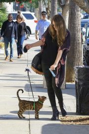 Kayla Tabish takes her Bengal cat for a walk in Studio City