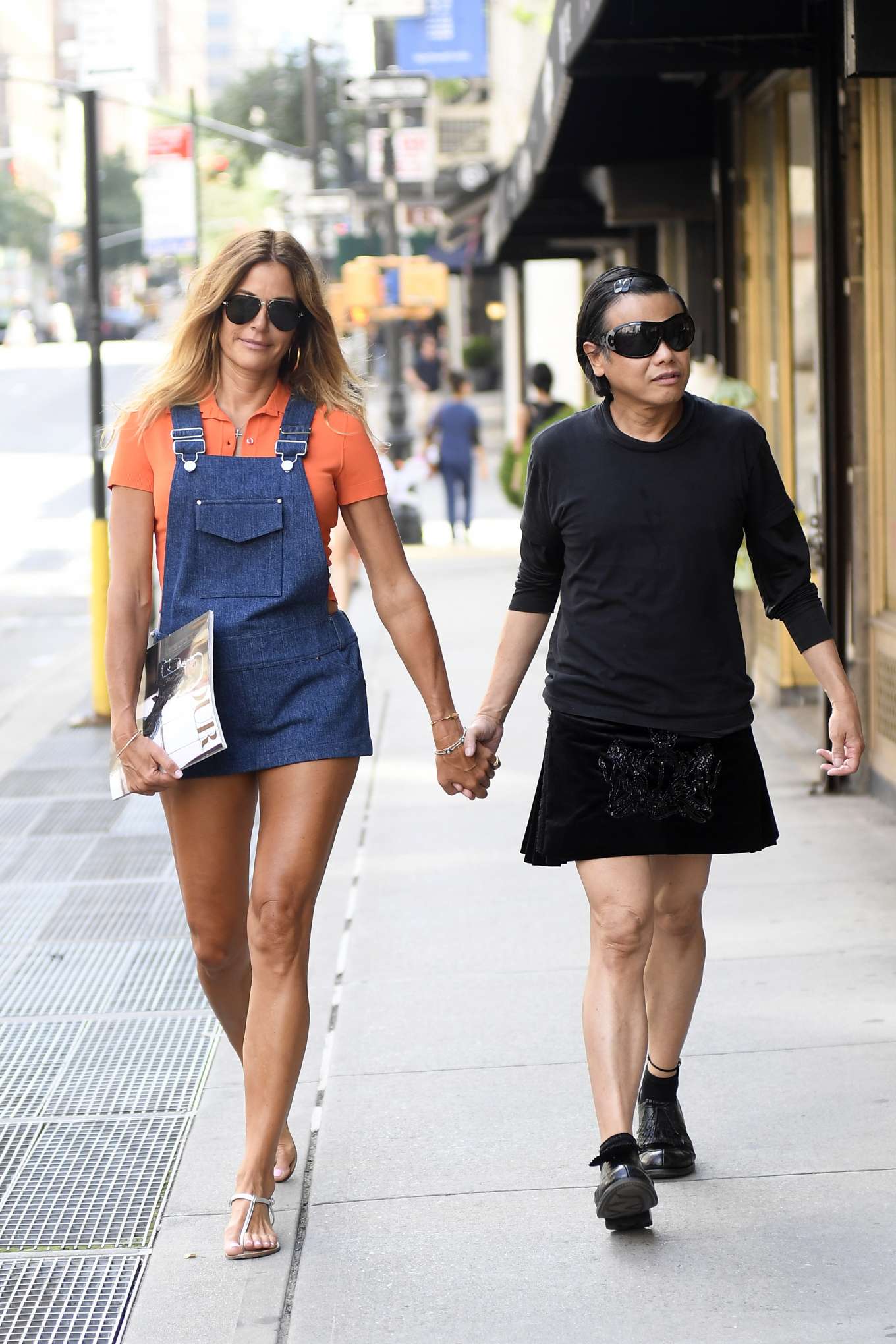 Kelly Bensimon with Fashion Designer Zang Toi on Madison Avenue in New York