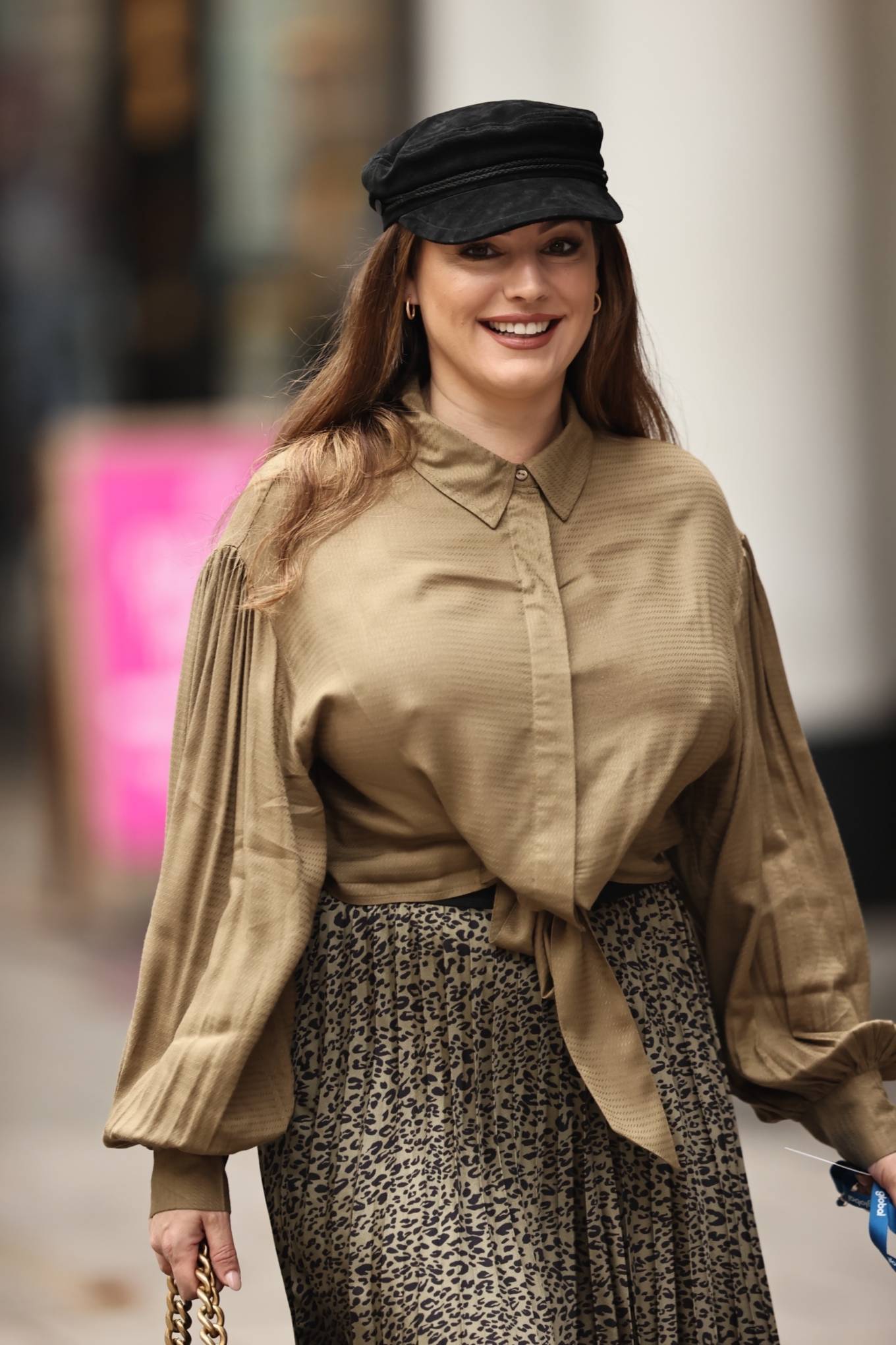 Kelly Brook - Arrives at Heart radio in satin blouse and pleated skirt in London