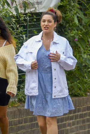 Kelly Brook in a broderie dress and denim jacket in London