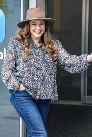 Kelly Brook - In a denim and hat at the Global Radio Studios in London