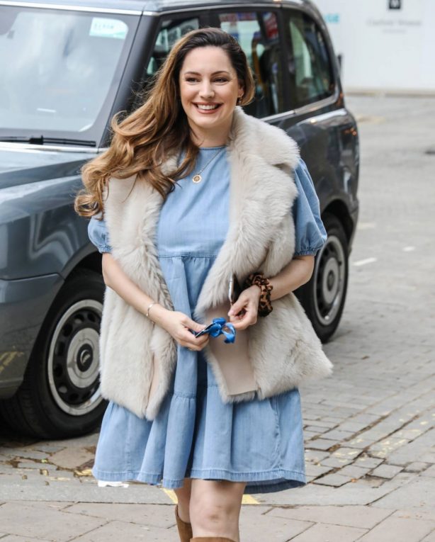 Kelly Brook - In a sky blue dress arriving for her Heart FM show at the Global Radio Studios