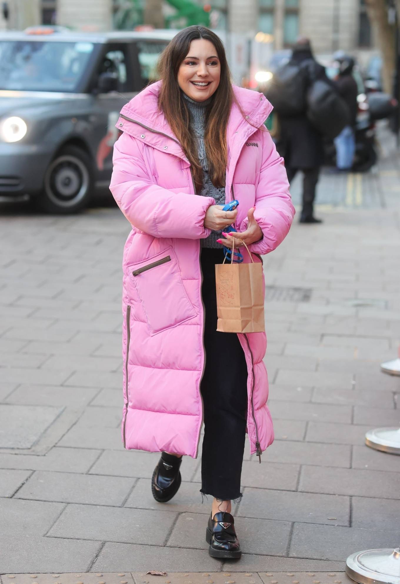 Kelly Brook - Looks pretty in pink at the Heart Radio Studios in London