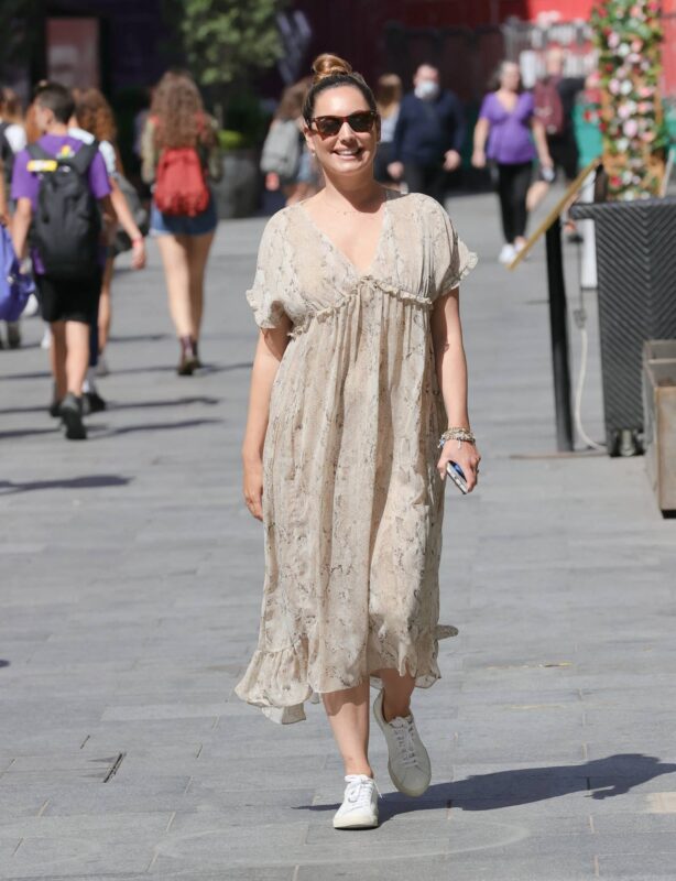 Kelly Brook - Looks sensational stepping out in a chiffon snakeskin dress in London