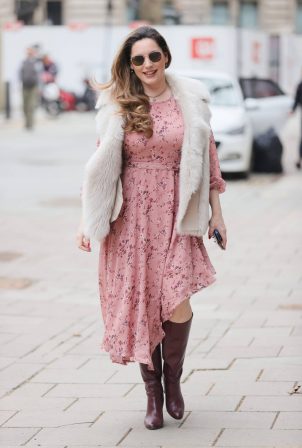 Kelly Brook - Looks stylish in a pink dress and leather boots at Heart radio in London