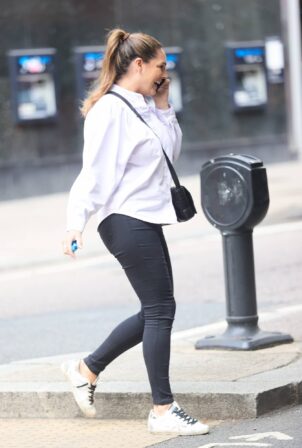 Kelly Brook - Seen in a white blouse and tight pants at Heart Radio in London