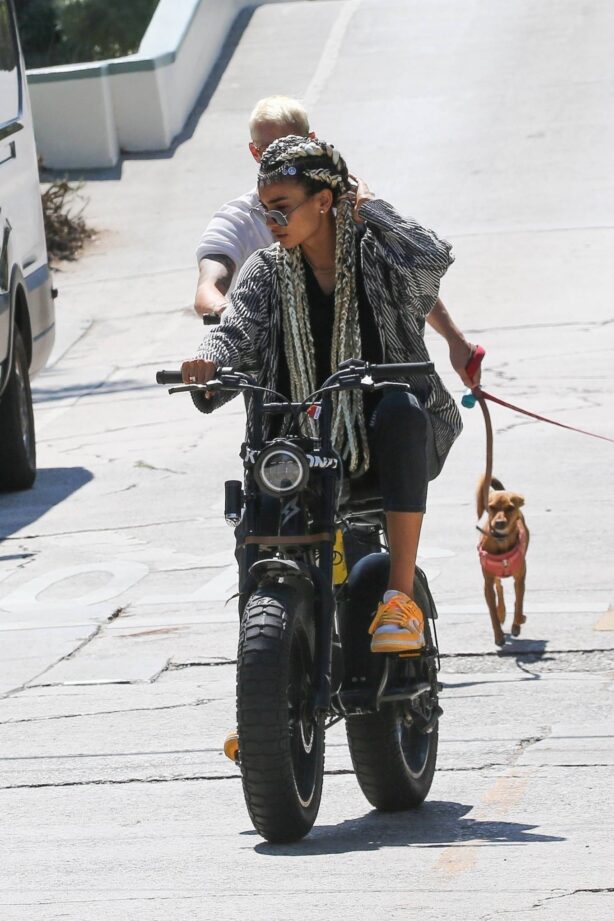 Kelly Gale - With Joel Kinnaman on a morning ride on their Super73 bikes in Venice Beach