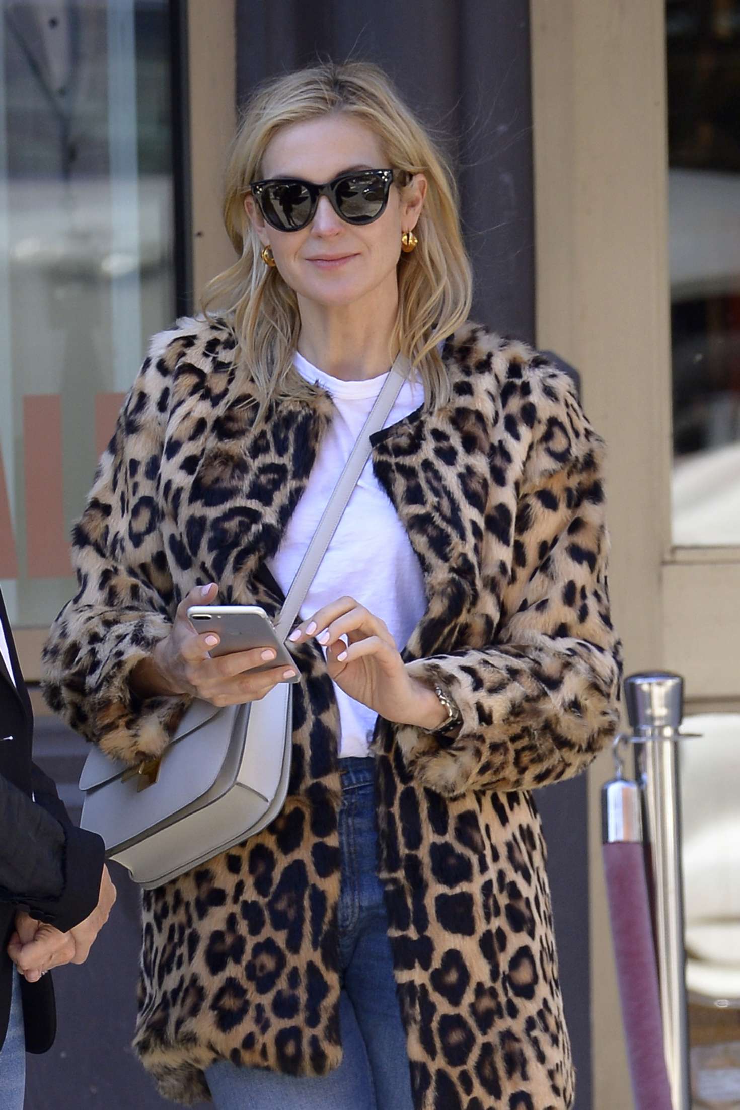 Kelly Rutherford in Leopard fur coat at Cipriani's in NY
