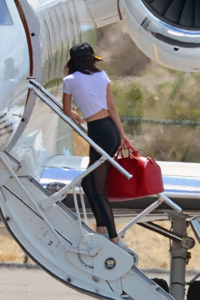 Kendall Jenner in Tights at a private airport in Turks and Caicos
